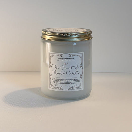 The Count of Monte Cristo literary candle, 7oz coconut apricot wax, grapefruit pink peppercorn plum black rose scent by Ink and Ember