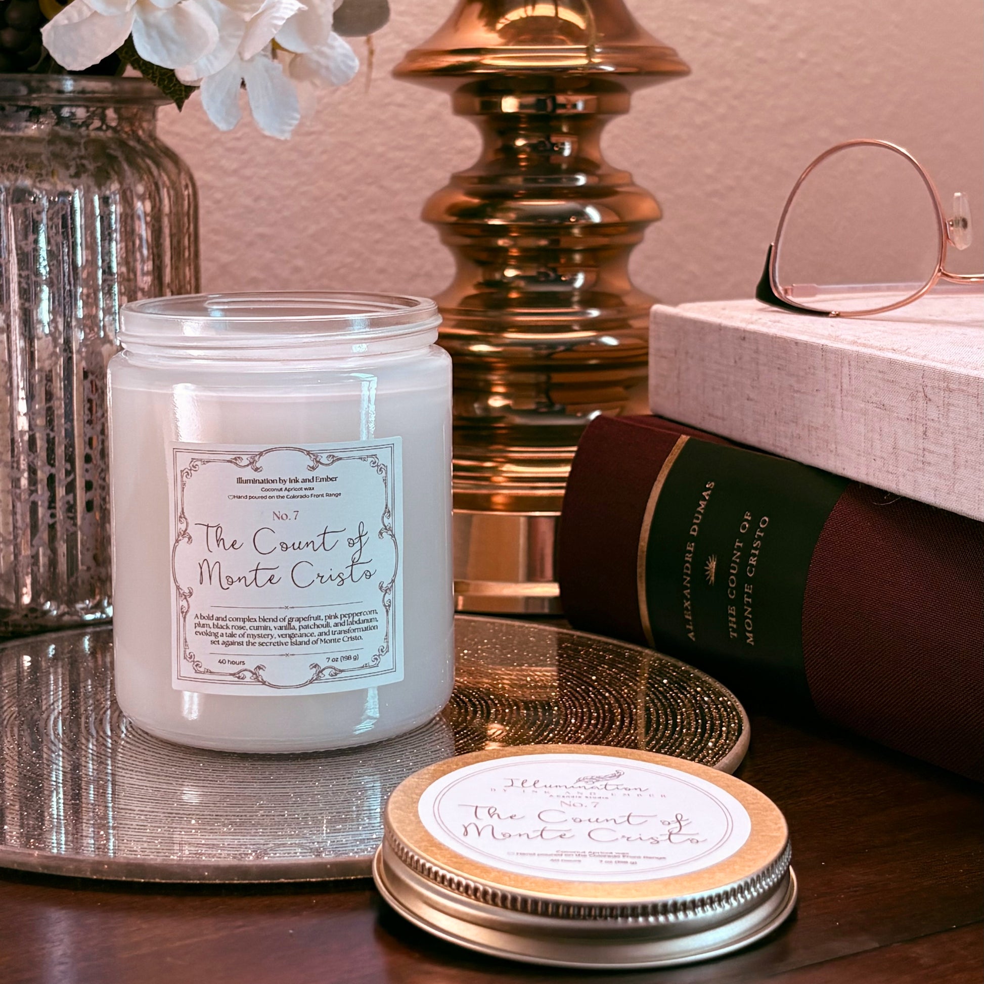 The Count of Monte Cristo literary candle by Illumination by Ink and Ember styled with Alexandre Dumas book and reading glasses